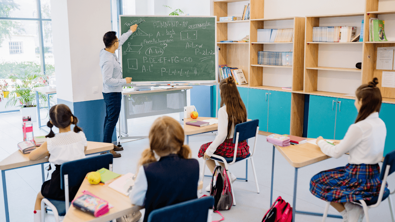 Teacher in class managing equipment distribution at the start of the school year with Fleezy