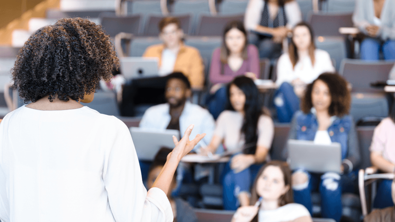Professor in a university lecture hall — digital asset management with Fleezy
